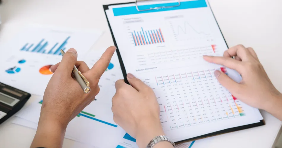 An image of two people conducting a content audit