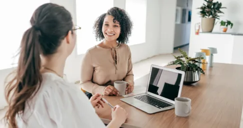 Two HR professionals chatting